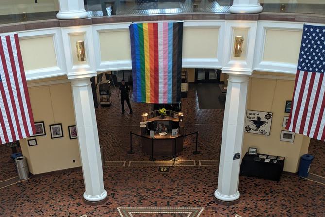 A Pride flag is currently hanging inside the Capitol’s East Wing Rotunda as part of a permitted display requested by the Commission on LGBTQ Affairs’ executive director.